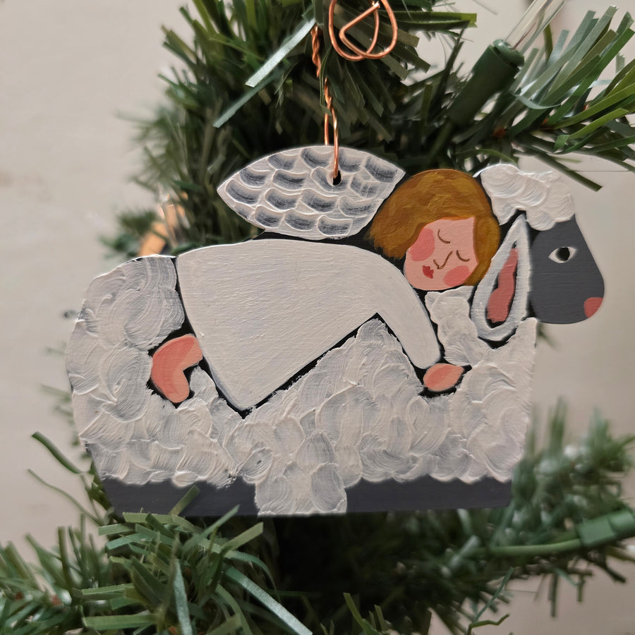 Nancy Thomas Angel on Lamb Ornament